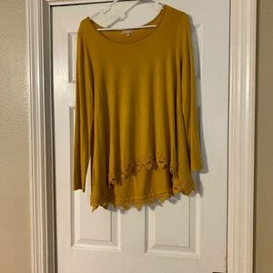 Gold blouse with lace edging